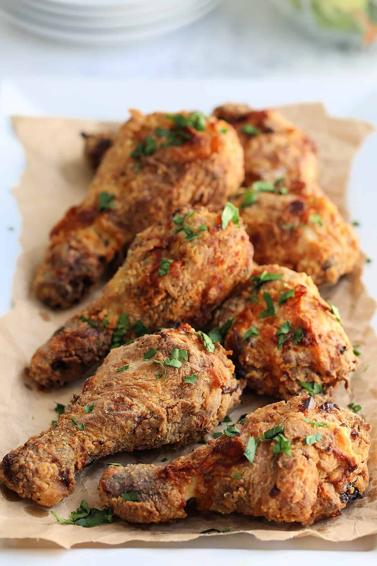 Golden air fryer chicken pieces arranged for serving